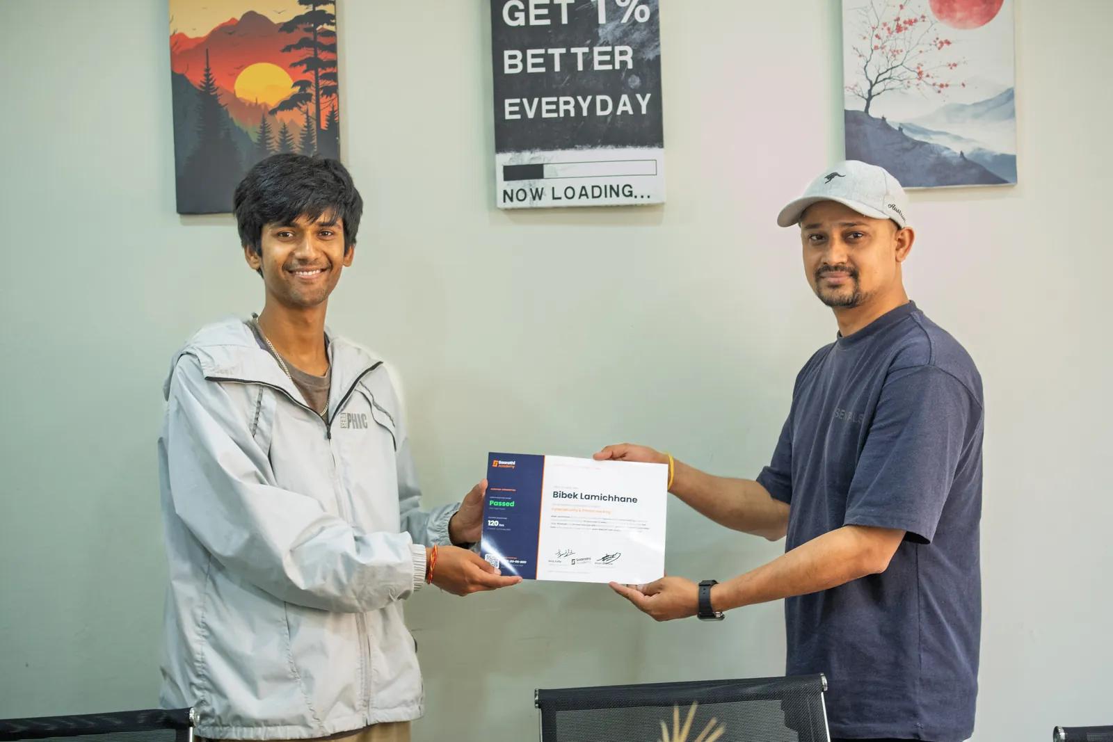 A student receiving his certificate