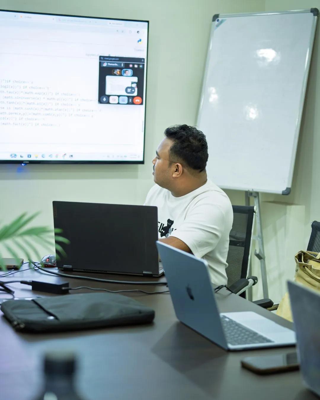 Instructor teaching at the screen