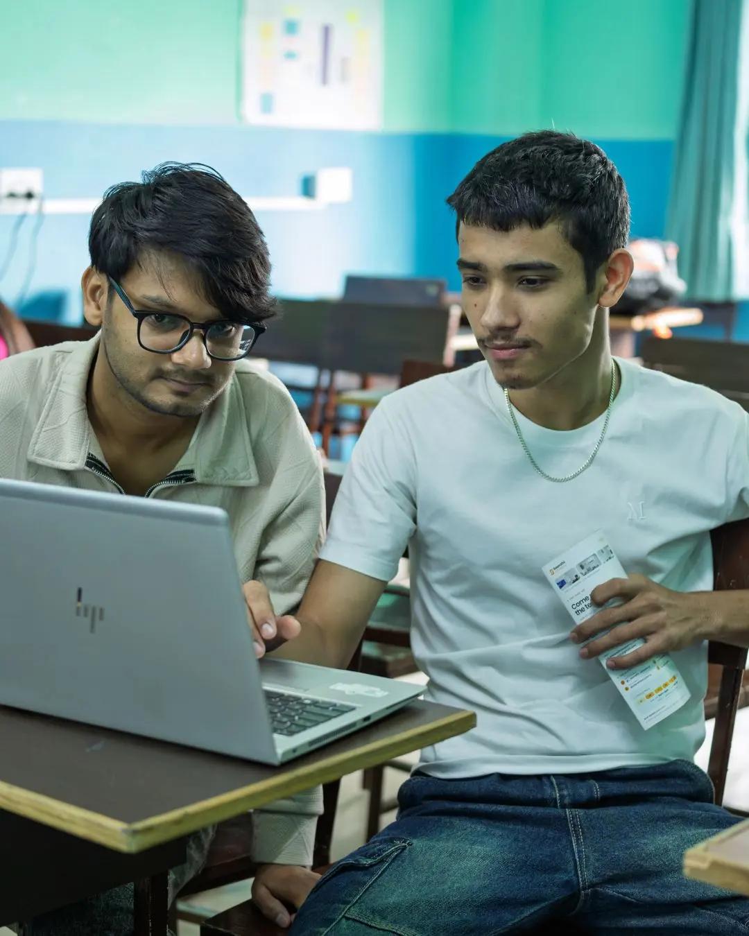 Two students pairing on an SEO audit